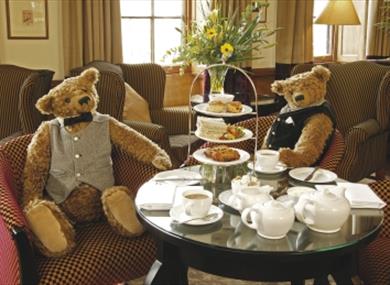 Teddy bears enjoying tea at the Macdonald Bear