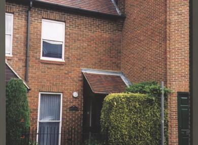 Attractive self-contained town house in convenient location for all amenities