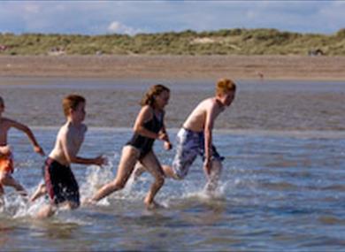 Children in the sea at West Beach, Littlehampton