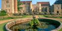 Medieval ancestral home of Viscount De L'Isle with historic gardens.