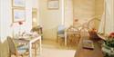 Our light, sunny breakfast room with echoes of the