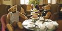 Teddy bears enjoying tea at the Macdonald Bear